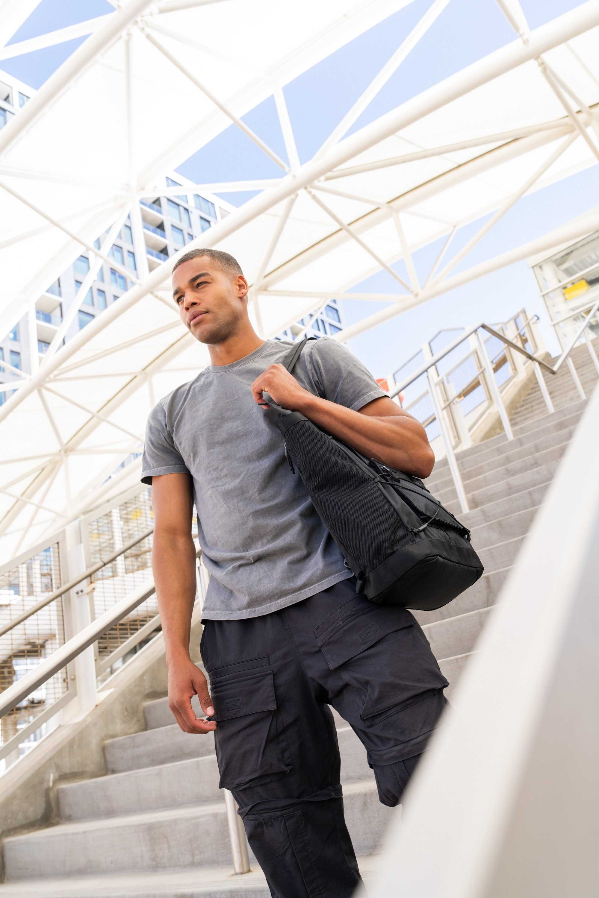 t-shirt, cargo pants, black bag, gray, urban